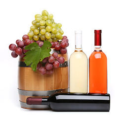 Image showing barrel and bottles of wine and ripe grapes