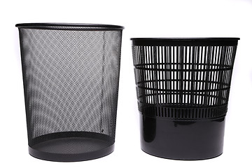 Image showing Metal and plastic trash cans on white background