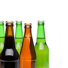 Image showing Closed bottles of beer on a white background