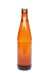 Image showing A brown bottle with drink on white background.