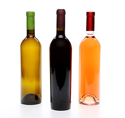 Image showing A set of three kinds of wine