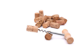 Image showing Bunch of wine corks and corkscrew