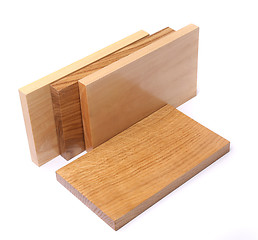 Image showing Three vertical boards (elm, acacia, lime)