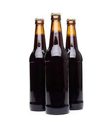 Image showing Three bottles of beer on white background.