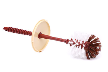 Image showing A toilet brush lies horizontally