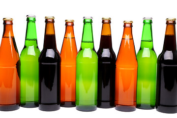 Image showing A row of beer bottles.