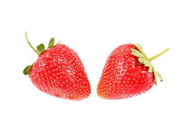 Image showing two fresh red strawberries with leaves