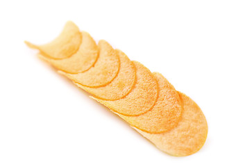 Image showing Row potato chips.