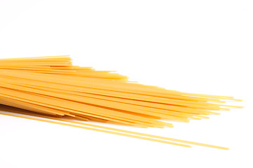 Image showing uncooked spaghetti close-up on a white background