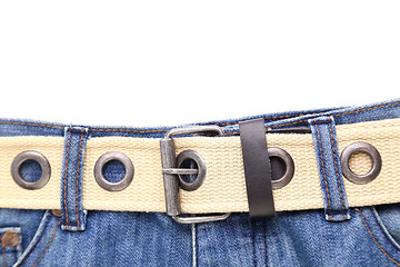 Image showing Blue jeans and leather white belt