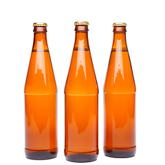 Image showing Three brown beer bottle