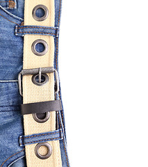 Image showing Blue jeans and leather belt