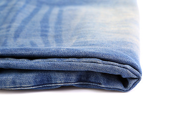 Image showing Blue jeans folded isolated on white