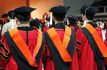 Image showing Three Asian university graduates