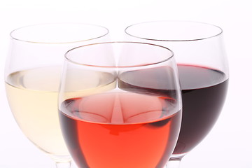 Image showing three glasses with white, rose and red wine