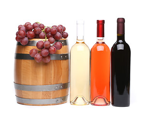 Image showing barrel and bottles of wine and ripe grapes