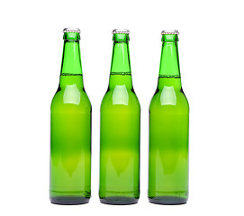 Image showing Three green beer bottle