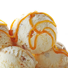 Image showing ice cream balls decorated with caramel sauce