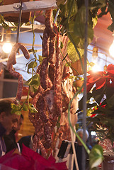 Image showing butcher sells meat on the local market