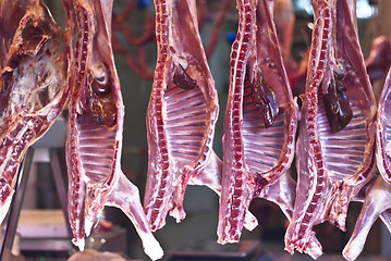 Image showing Raw meat in a carnage at the market
