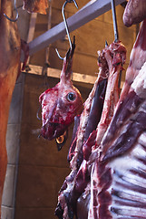 Image showing Raw meat in a carnage at the market