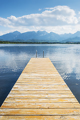 Image showing Jetty with lake and alps