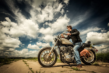 Image showing Biker on the road