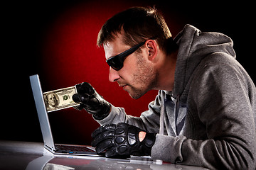 Image showing Hacker with laptop