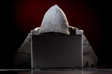 Image showing Hacker with laptop