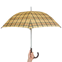 Image showing Opened umbrella in hand