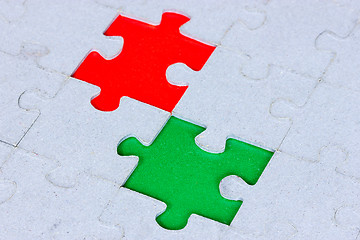 Image showing Puzzle with a green and red gap