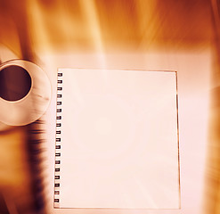 Image showing White cup and white page