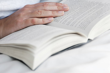 Image showing Hand and Open Book