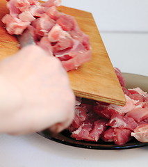 Image showing cook,  cut meat