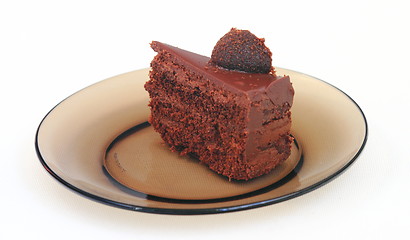 Image showing piece of cake on a dark dish