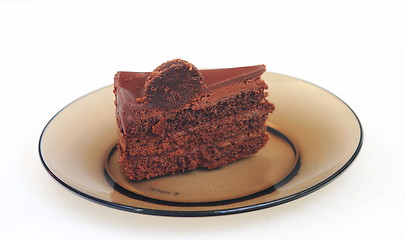 Image showing piece of cake on a dark dish