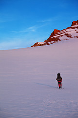 Image showing Hiker in sunrise mountains