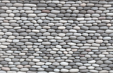Image showing Background - wall decorated with smooth stones