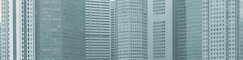 Image showing Panoramic background - windows of high-rise city buildings