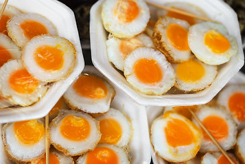 Image showing Scrambled quail eggs at the eastern market close-up