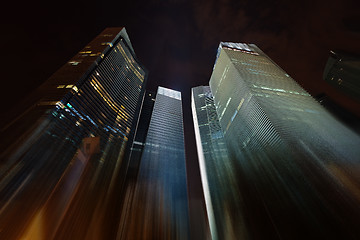 Image showing Night skyscrapers stretching into the sky