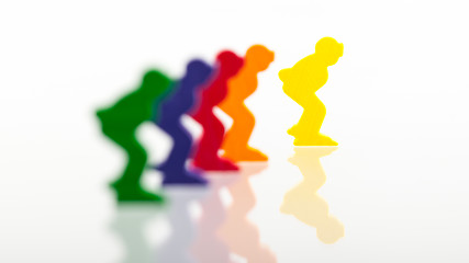 Image showing Five colored pawns isolated on a white background