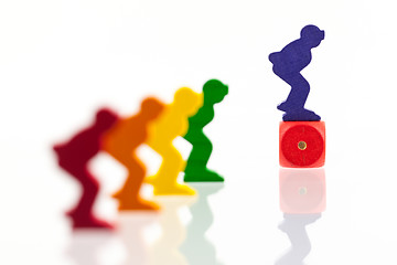 Image showing Five colored pawns isolated on a white background