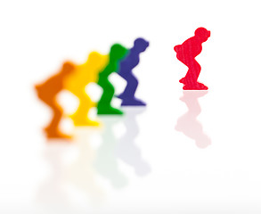 Image showing Five colored pawns isolated on a white background