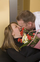 Image showing man offering flowers