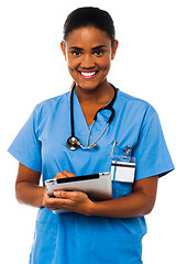 Image showing Female physician holding tablet pc