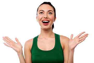 Image showing Cute girl laughing heartily with open hands