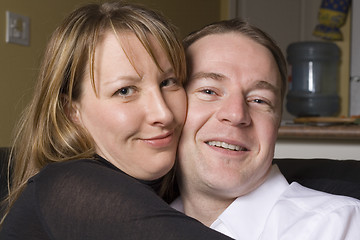 Image showing happy couple relaxing on couch