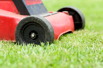 Image showing Lawnmower on grass