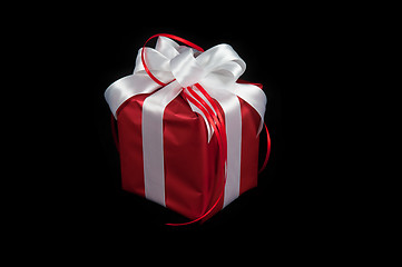 Image showing red gift box on black